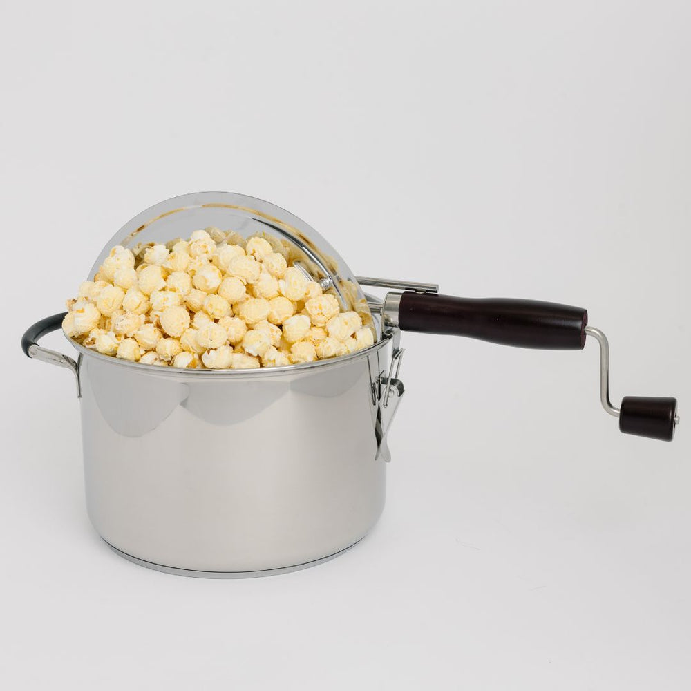 Stovetop popcorn popper filled with mushroom popcorn